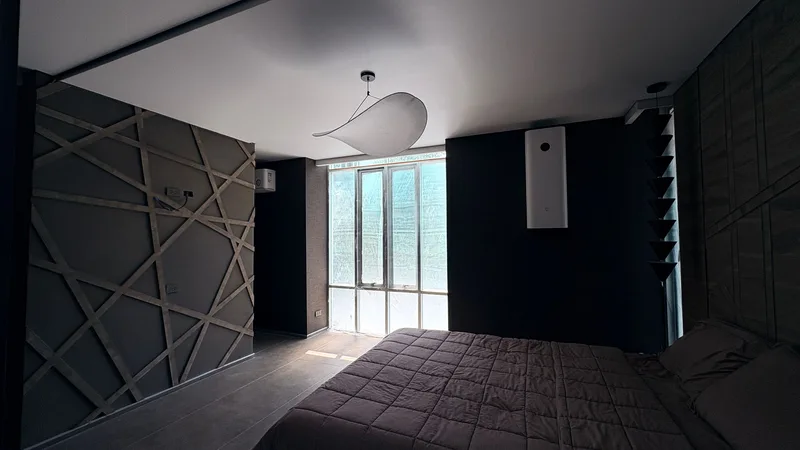 Designer bedroom with stretch walls