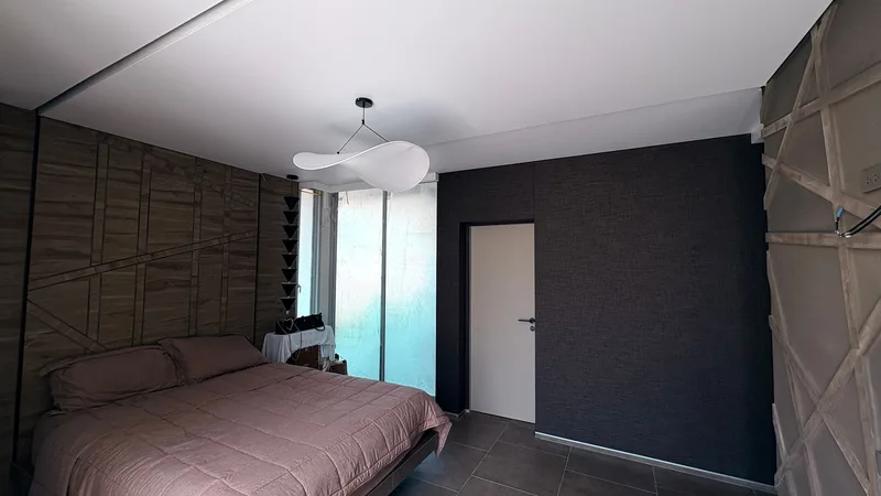 Finished bedroom with stretch walls