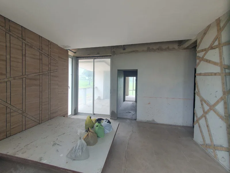 Construction site with framing and debris